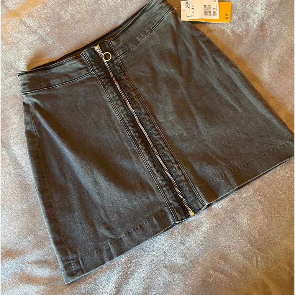 H&M - black denim skirt. NWT. Size 8